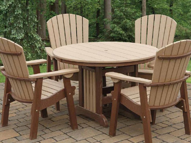 a brown poly dining set with four chairs shown outdoors on a stone patio